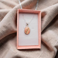 Rhodochrosite on Silver Pendant
